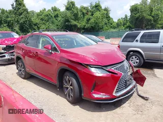 2022 Lexus RX 450h with VIN 2T2HGMDA0NC090560, listed as a IAAI auction lot 42604723 with 28,532 mi miles and . Bid and sale history available at DreamBid. Image 1.
