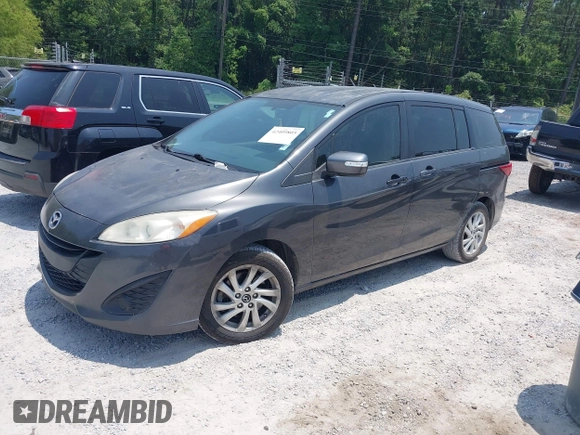 2015 Mazda 5 Sport with VIN JM1CW2BL7F0183114, listed as a IAAI auction lot 42409805 with 174,606 mi miles and . Bid and sale history available at DreamBid. Image 2.