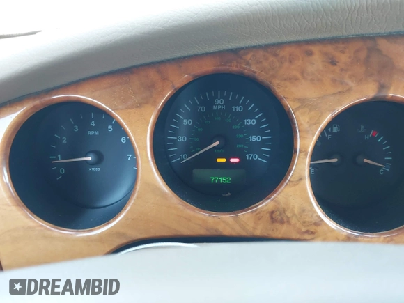 2002 Jaguar XK with VIN SAJDA42C12NA30499, listed as a IAAI auction lot 41954577 with 77,152 mi miles and . Bid and sale history available at DreamBid. Image 7.