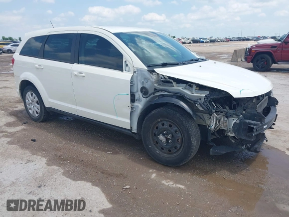 2013 Dodge Journey SE z VIN 3C4PDCAB1DT715883, wystawiony jako IAAI lot #42188089 z przebiegiem 111 905 mil mil oraz . Historia ofert i sprzedaży dostępna na DreamBid. Obrazek 1.