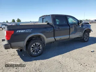 2017 Nissan Titan Pro-4X z VIN 1N6BA1F42HN530830, wystawiony jako Copart lot #63860384 z przebiegiem 317 812 mil mil oraz Szkoda całkowita • Salvage title. Historia ofert i sprzedaży dostępna na DreamBid. Obrazek 3.