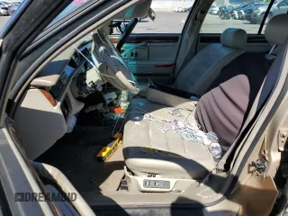 1995 Cadillac DeVille z VIN 1G6KD52B6SU274827, wystawiony jako Copart lot #41902125 z przebiegiem Nie podano mil oraz Szkoda całkowita • Salvage title. Historia ofert i sprzedaży dostępna na DreamBid. Obrazek 7.