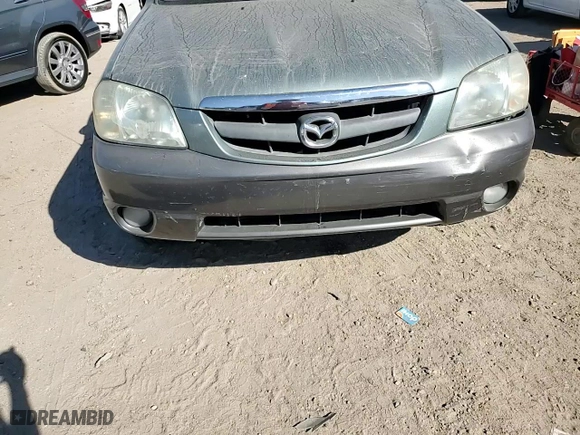 2004 Mazda Tribute ES with VIN 4F2CZ06114KM02980, listed as a Copart auction lot 77319964 with 178,922 mi miles and Salvage Title. Bid and sale history available at carsss.com. Image 11.