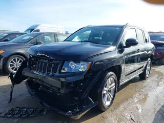 2015 Jeep Compass Sport with VIN 1C4NJDBBXFD114579, listed as a IAAI auction lot 41911501 with 95,732 mi miles and . Bid and sale history available at carsss.com. Image 2.