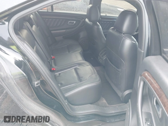 2013 Ford Taurus Limited with VIN 1FAHP2F80DG114817, listed as a IAAI auction lot 41429111 with 207,104 mi miles. Bid and sale history available at carsss.com. Image 8.