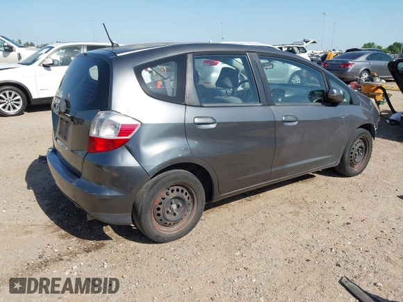 2013 Honda Fit with VIN JHMGE8H37DC048529, listed as a IAAI auction lot 42011202 with 255,113 mi miles. Bid and sale history available at carsss.com. Image 4.