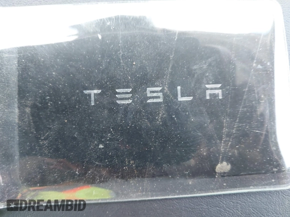 2023 Tesla Model Y Long Range with VIN 7SAYGAEE7PF615751, listed as a IAAI auction lot 42297819 with 31,201 mi miles and . Bid and sale history available at DreamBid. Image 11.