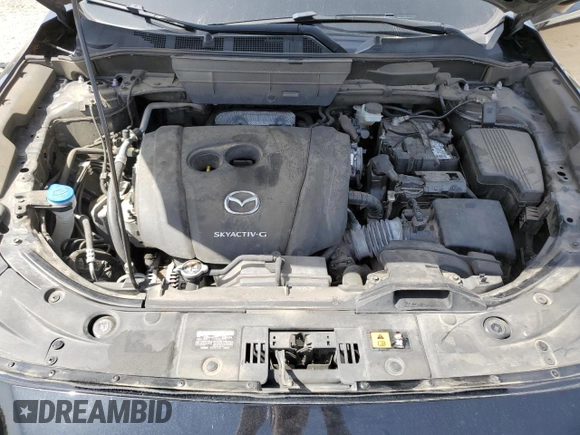 2018 Mazda CX-5 Grand Touring z VIN JM3KFADM2J1381752, wystawiony jako Copart lot #56889835 z przebiegiem 96 820 mil mil oraz Szkoda całkowita • Salvage title. Historia ofert i sprzedaży dostępna na DreamBid. Obrazek 11.
