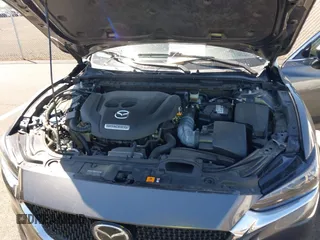2020 Mazda 6 Grand Touring with VIN JM1GL1TY0L1522025, listed as a IAAI auction lot 41876429 with 68,101 mi miles and . Bid and sale history available at DreamBid. Image 10.