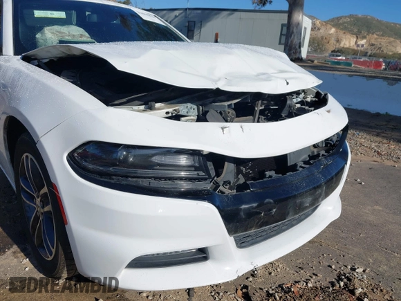2019 Dodge Charger SXT with VIN 2C3CDXJGXKH533322, listed as a IAAI auction lot 41808838 with 95,877 mi miles and . Bid and sale history available at DreamBid. Image 18.