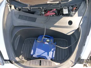 2022 Tesla Model 3 with VIN 5YJ3E1EA4NF319237, listed as a IAAI auction lot 41263761 with 44,384 mi miles and . Bid and sale history available at DreamBid. Image 10.