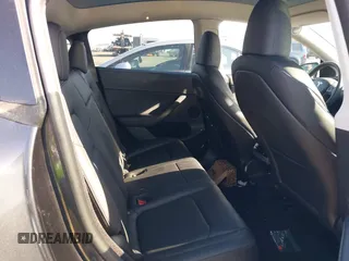 2024 Tesla Model Y z VIN 7SAYGDED8RF158878, wystawiony jako IAAI lot #42514586 z przebiegiem 18 594 mil mil oraz . Historia ofert i sprzedaży dostępna na DreamBid. Obrazek 8.