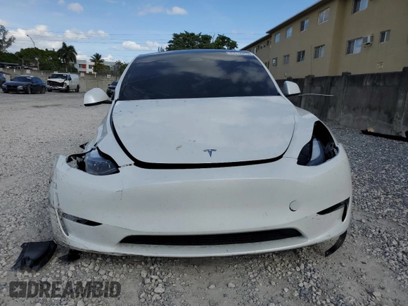 2024 Tesla Model Y Performance with VIN 7SAYGDEF3RF050704, listed as a Copart auction lot 45512455 with 15,539 mi miles and Salvage Title. Bid and sale history available at DreamBid. Image 5.