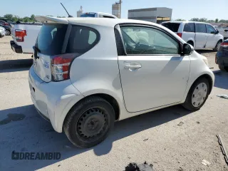 2012 Scion iQ with VIN JTNJJXB06CJ019475, listed as a Copart auction lot 61358615 with 94,194 mi miles and Clean title. Bid and sale history available at DreamBid. Image 3.