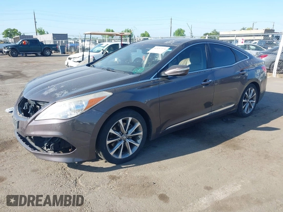 2015 Hyundai Azera with VIN KMHFG4JGXFA439603, listed as a IAAI auction lot 42157274 with 135,990 mi miles and . Bid and sale history available at carsss.com. Image 2.