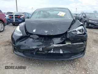 2021 Tesla Model 3 Long Range with VIN 5YJ3E1EB4MF012822, listed as a IAAI auction lot 41918721 with 69,105 mi miles. Bid and sale history available at carsss.com. Image 12.