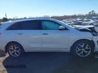 2016 Kia Sorento SX with VIN 5XYPKDA55GG174984, listed as a IAAI auction lot 41216303 with 142,875 mi miles. Bid and sale history available at carsss.com. Image 14.