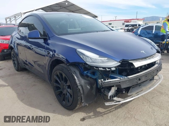 2022 Tesla Model Y Long Range with VIN 7SAYGDEE0NA019067, listed as a IAAI auction lot 41645198 with 49,336 mi miles and . Bid and sale history available at DreamBid. Image 1.