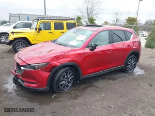 2017 Mazda CX-5 Grand Touring with VIN JM3KFBDL0H0177495, listed as a IAAI auction lot 41722655 with 58,972 mi miles. Bid and sale history available at carsss.com. Image 2.