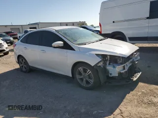 2017 Ford Focus SE with VIN 1FADP3FE8HL284169, listed as a Copart auction lot 61732695 with 70,443 mi miles and Salvage title. Bid and sale history available at DreamBid. Image 4.