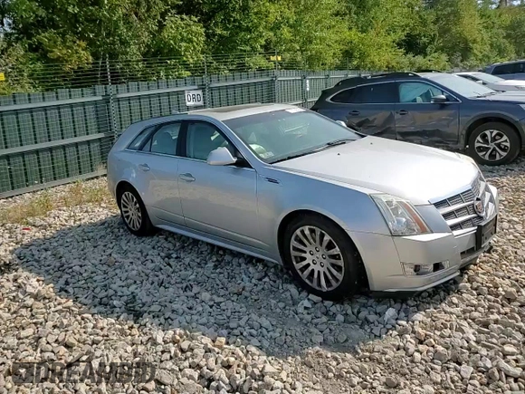 2010 Cadillac CTS Performance z VIN 1G6DM8EG9A0126811, wystawiony jako Copart lot #71155534 z przebiegiem 146 947 mil mil oraz Szkoda całkowita • Salvage title. Historia ofert i sprzedaży dostępna na DreamBid. Obrazek 11.