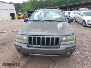 2004 Jeep Grand Cherokee Laredo with VIN 1J4GX48S14C176318, listed as a IAAI auction lot 41887810 with 1 mi miles. Bid and sale history available at carsss.com. Image 6.
