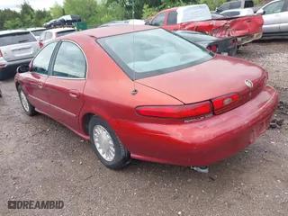 1999 Mercury Sable GS with VIN 1MEFM50UXXA649466, listed as a IAAI auction lot 42094811 with 122,644 mi miles. Bid and sale history available at carsss.com. Image 3.