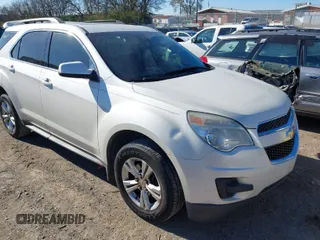2014 Chevrolet Equinox LT z VIN 1GNALBEKXEZ108640, wystawiony jako IAAI lot #41043768 z przebiegiem 209 450 mil mil oraz . Historia ofert i sprzedaży dostępna na DreamBid. Obrazek 1.