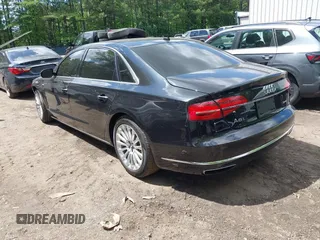 2015 Audi A8 3.0T z VIN WAU3GAFD4FN039482, wystawiony jako IAAI lot #42330349 z przebiegiem 132 718 mil mil oraz . Historia ofert i sprzedaży dostępna na DreamBid. Obrazek 3.