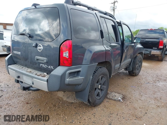 2014 Nissan Xterra X with VIN 5N1AN0NW4EN813172, listed as a IAAI auction lot 42010220 with 185,971 mi miles and . Bid and sale history available at DreamBid. Image 4.