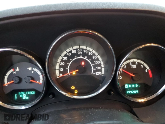 2010 Dodge Caliber Mainstreet z VIN 1B3CB3HAXAD551716, wystawiony jako Copart lot #77349503 z przebiegiem 144 209 mil mil oraz Tytuł czysty. Historia ofert i sprzedaży dostępna na DreamBid. Obrazek 9.