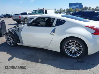 2018 Nissan 370Z Sport with VIN JN1AZ4EH3JM571169, listed as a IAAI auction lot 41859730 with 85,428 mi miles and . Bid and sale history available at DreamBid. Image 14.
