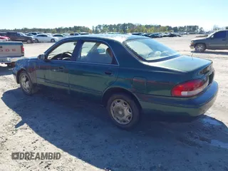 1999 Mazda 626 ES with VIN 1YVGF22C2X5859646, listed as a IAAI auction lot 41887343 with 1 mi miles. Bid and sale history available at carsss.com. Image 3.