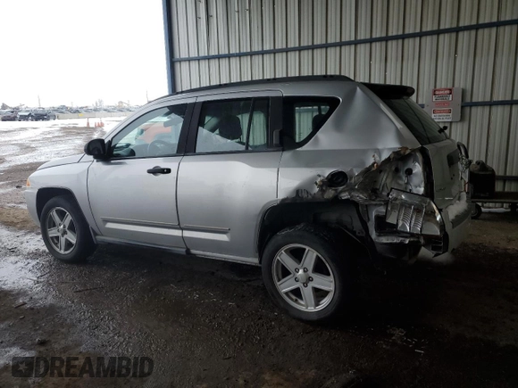 2010 Jeep Compass Sport with VIN 1J4NF4FB6AD521894, listed as a Copart auction lot 46027325 with 149,230 mi miles and Salvage Title. Bid and sale history available at carsss.com. Image 2.