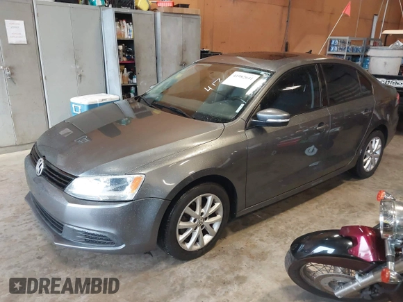 2011 Volkswagen Jetta Sedan SE PZEV with VIN 3VWDZ7AJ9BM369301, listed as a IAAI auction lot 41982641 with 114,217 mi miles. Bid and sale history available at carsss.com. Image 2.