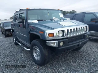 2005 Hummer H2 SUT with VIN 5GRGN22U15H114401, listed as a IAAI auction lot 41268764 with 166,651 mi miles. Bid and sale history available at carsss.com. Image 1.