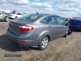 2014 Ford Fiesta SE with VIN 3FADP4BJ1EM199936, listed as a IAAI auction lot 41988670 with 44,846 mi miles and . Bid and sale history available at DreamBid. Image 4.
