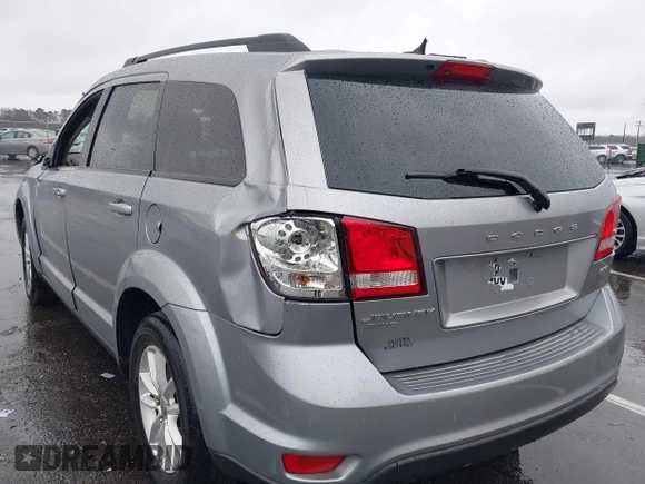 2016 Dodge Journey SXT with VIN 3C4PDDBG7GT173158, listed as a IAAI auction lot 42020182 with 159,136 mi miles. Bid and sale history available at carsss.com. Image 3.