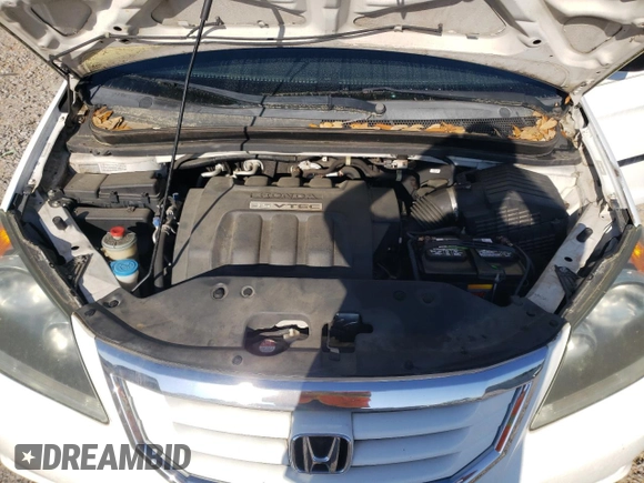 2010 Honda Odyssey LX с VIN 5FNRL3H25AB090500, выставлен на аукционе Copart как лот 48148265 с пробегом 57 537 миль миль и Списание • Salvage title. История ставок и продаж доступна на DreamBid. Изображение 12.