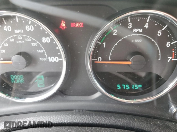 2016 Jeep Wrangler Unlimited Sport with VIN 1C4BJWDG8GL346676, listed as a Copart auction lot 57972665 with 57,515 mi miles and Salvage title. Bid and sale history available at DreamBid. Image 9.