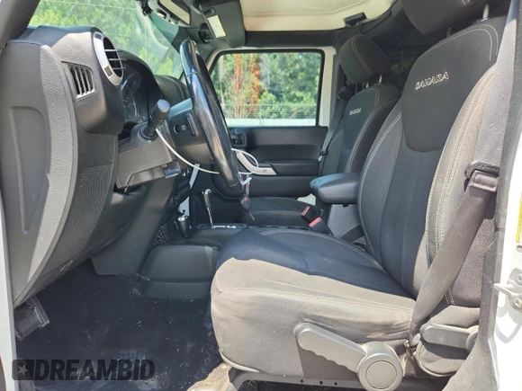2016 Jeep Wrangler Unlimited Sahara с VIN 1C4HJWEG3GL346528, выставлен на аукционе Copart как лот 65092755 с пробегом 127 393 миль миль и Списание • Salvage title. История ставок и продаж доступна на DreamBid. Изображение 7.