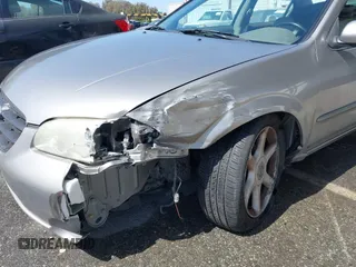 2001 Nissan Maxima GXE with VIN JN1CA31D41T815592, listed as a IAAI auction lot 42465005 with 96,822 mi miles and . Bid and sale history available at DreamBid. Image 6.