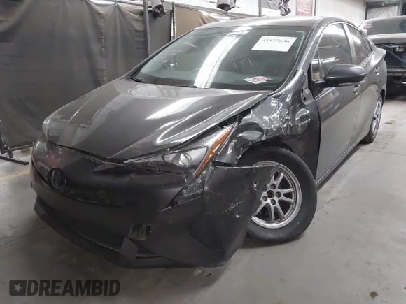 2018 Toyota Prius Two with VIN JTDKARFU6J3553871, listed as a IAAI auction lot 41577636 with 118,715 mi miles. Bid and sale history available at carsss.com. Image 2.