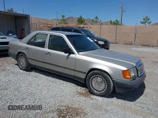 1986 Mercedes-Benz 300 E z VIN WDBEA30DXGA214357, wystawiony jako IAAI lot #42517226 z przebiegiem 169 670 mil mil oraz . Historia ofert i sprzedaży dostępna na DreamBid. Obrazek 1.