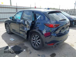 2018 Mazda CX-5 Touring with VIN JM3KFACM3J1370129, listed as a IAAI auction lot 41829027 with 71,305 mi miles. Bid and sale history available at carsss.com. Image 3.