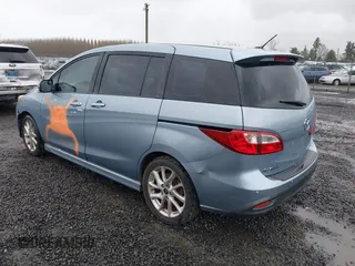 2013 Mazda 5 Grand Touring z VIN JM1CW2DL2D0153982, wystawiony jako IAAI lot #41857697 z przebiegiem 98 053 mil mil oraz . Historia ofert i sprzedaży dostępna na DreamBid. Obrazek 3.