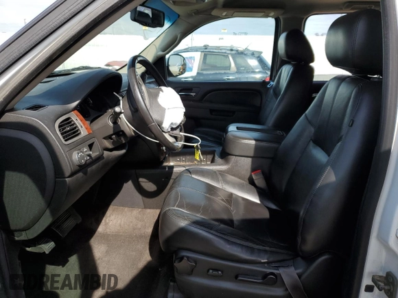2014 Chevrolet Suburban LT with VIN 1GNSCJE00ER209005, listed as a Copart auction lot 45729745 with 129,662 mi miles and Salvage Title. Bid and sale history available at carsss.com. Image 7.