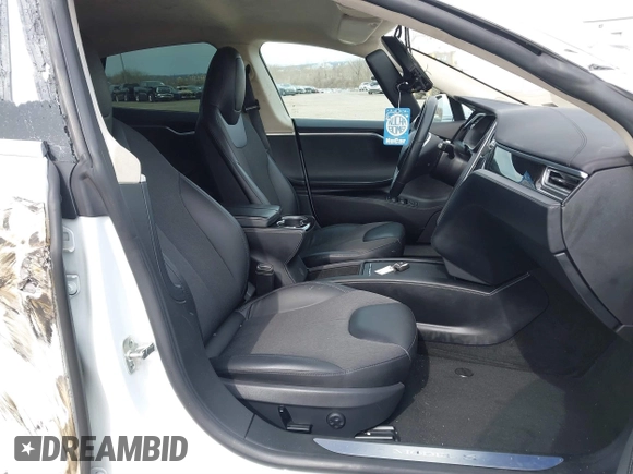 2016 Tesla Model S 70 kWh Battery with VIN 5YJSA1E15GF135841, listed as a IAAI auction lot 41846535 with 87,312 mi miles. Bid and sale history available at carsss.com. Image 5.