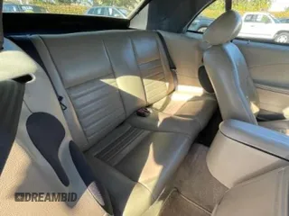 2004 Ford Mustang GT Deluxe z VIN 1FAFP45XX4F150757, wystawiony jako Copart lot #47502605 z przebiegiem 43 827 mil mil oraz Tytuł czysty. Historia ofert i sprzedaży dostępna na DreamBid. Obrazek 6.