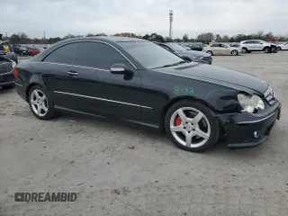 2009 Mercedes-Benz CLK 350 with VIN WDBTJ56H79F268881, listed as a Copart auction lot 79598644 with 147,088 mi miles and Salvage Title. Bid and sale history available at DreamBid. Image 4.
